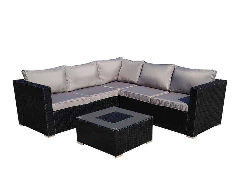 Grey velvet armchair with plush cushioning and solid frame