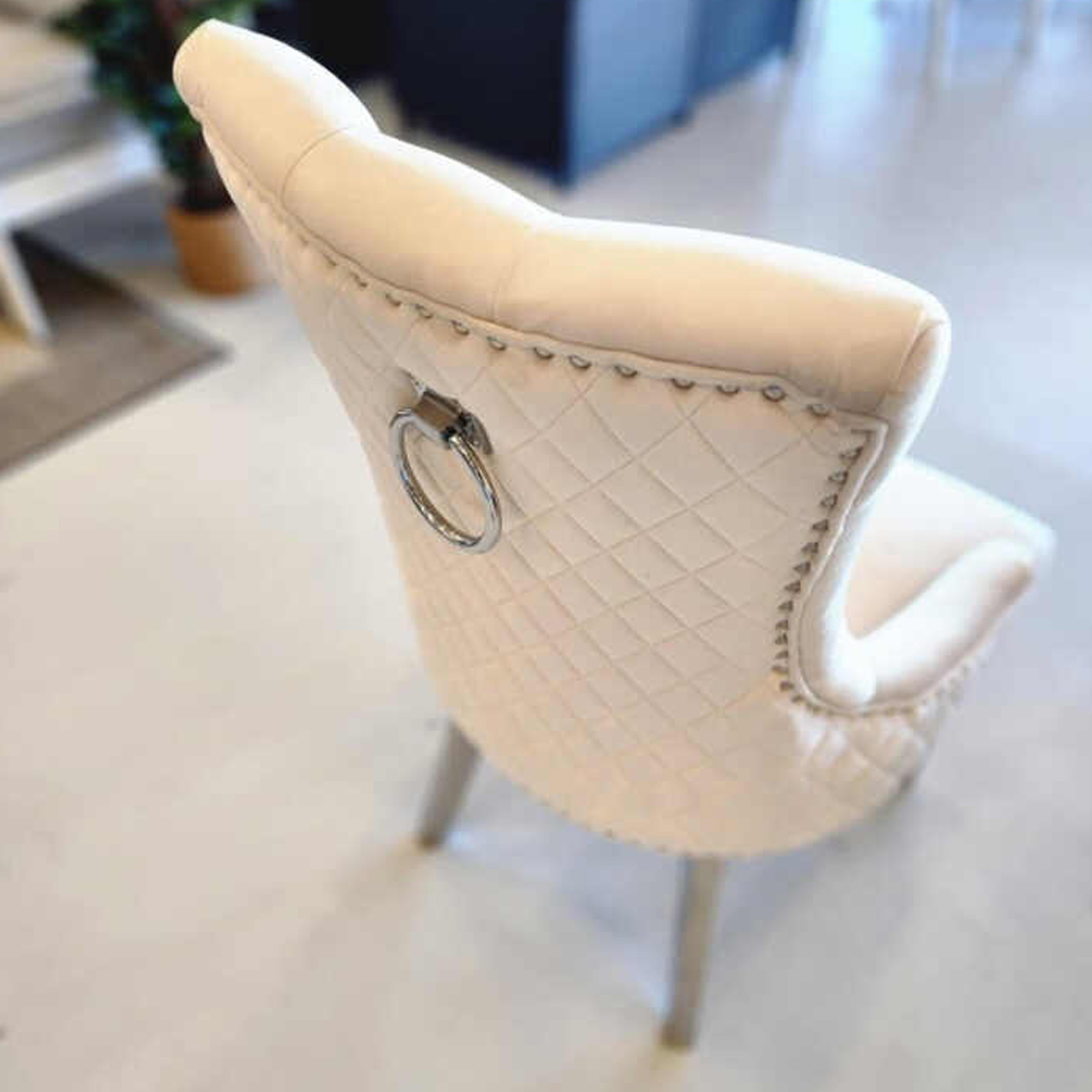 Zara French luxury provincial cream velvet dining chair with stainless steel legs, side view