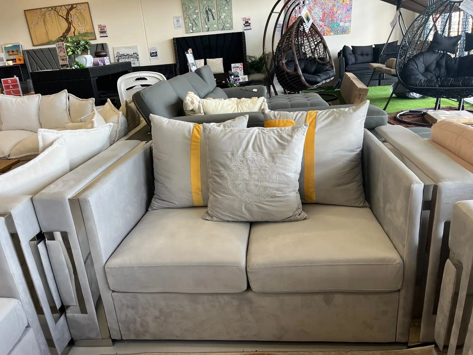 Amara 2 seater grey velvet loveseat with silver frame and matching cushions